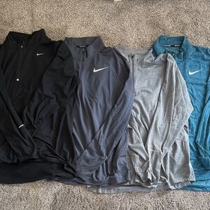 Bundle of 4 Nike Long Sleeve Athletic Tops - Black, Charcoal, Gray, Teal